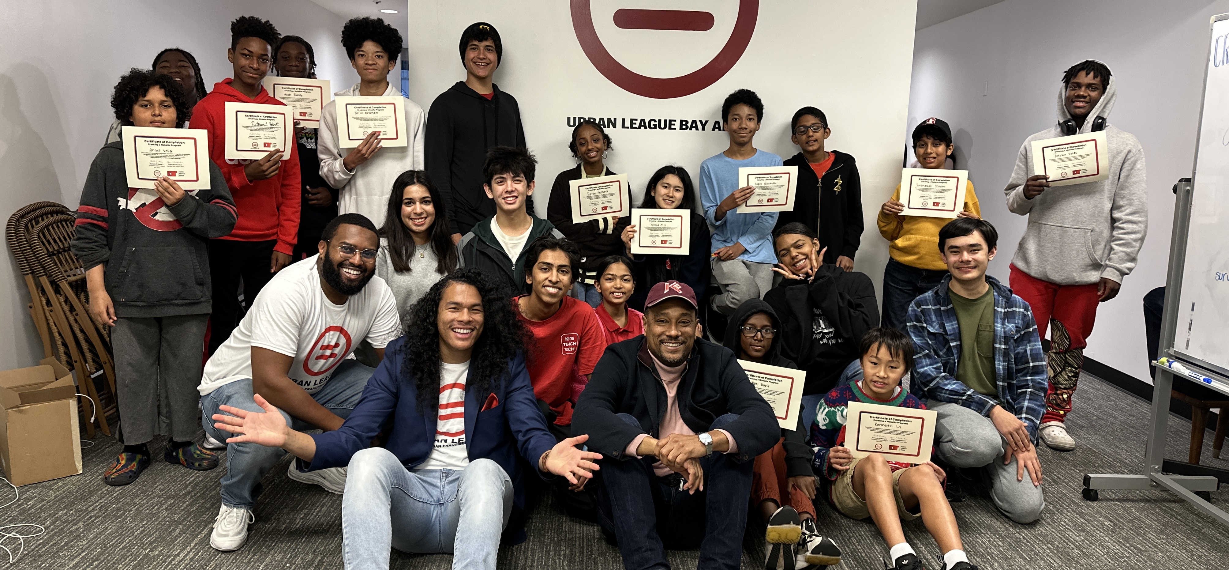 Slide Image - team posing with basketball player