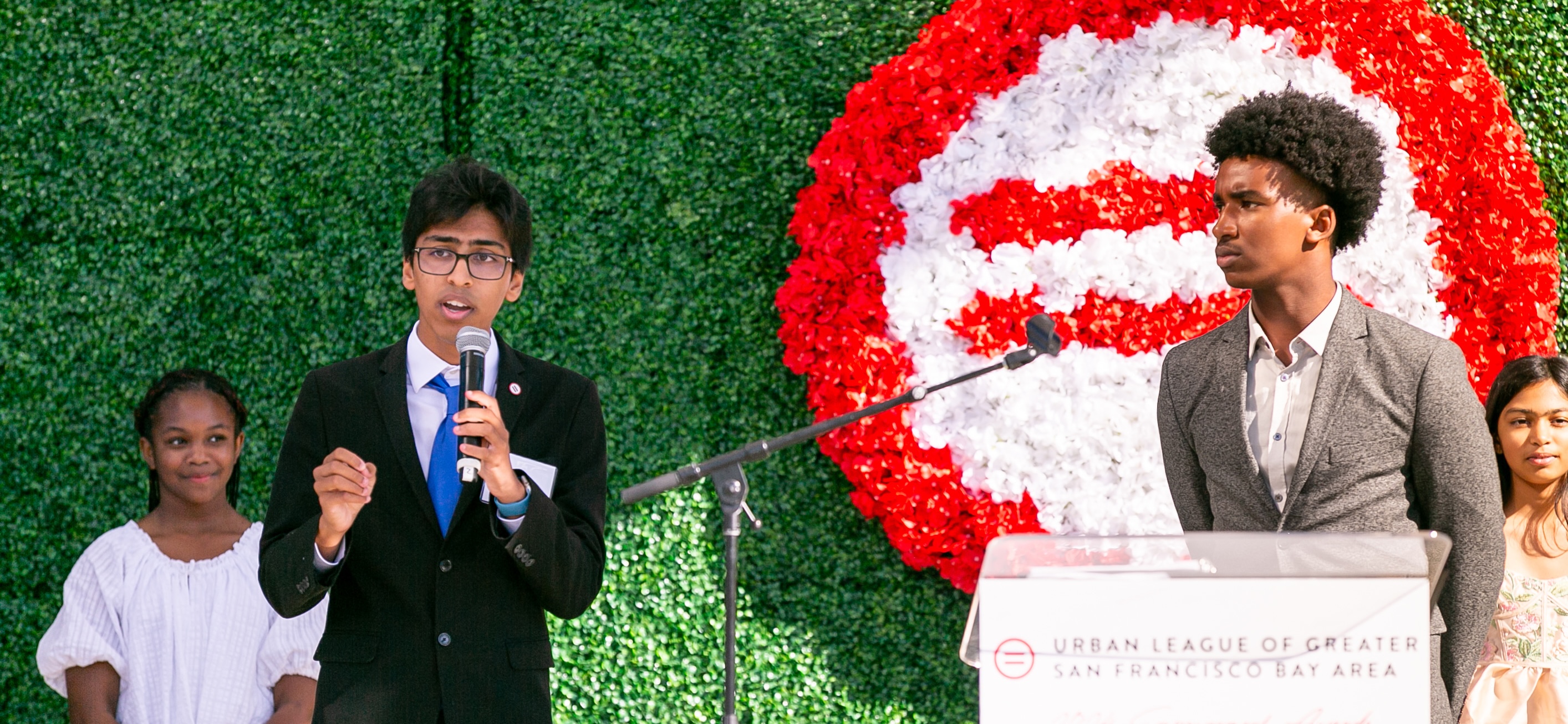 Slide Image - students and team posing for picture