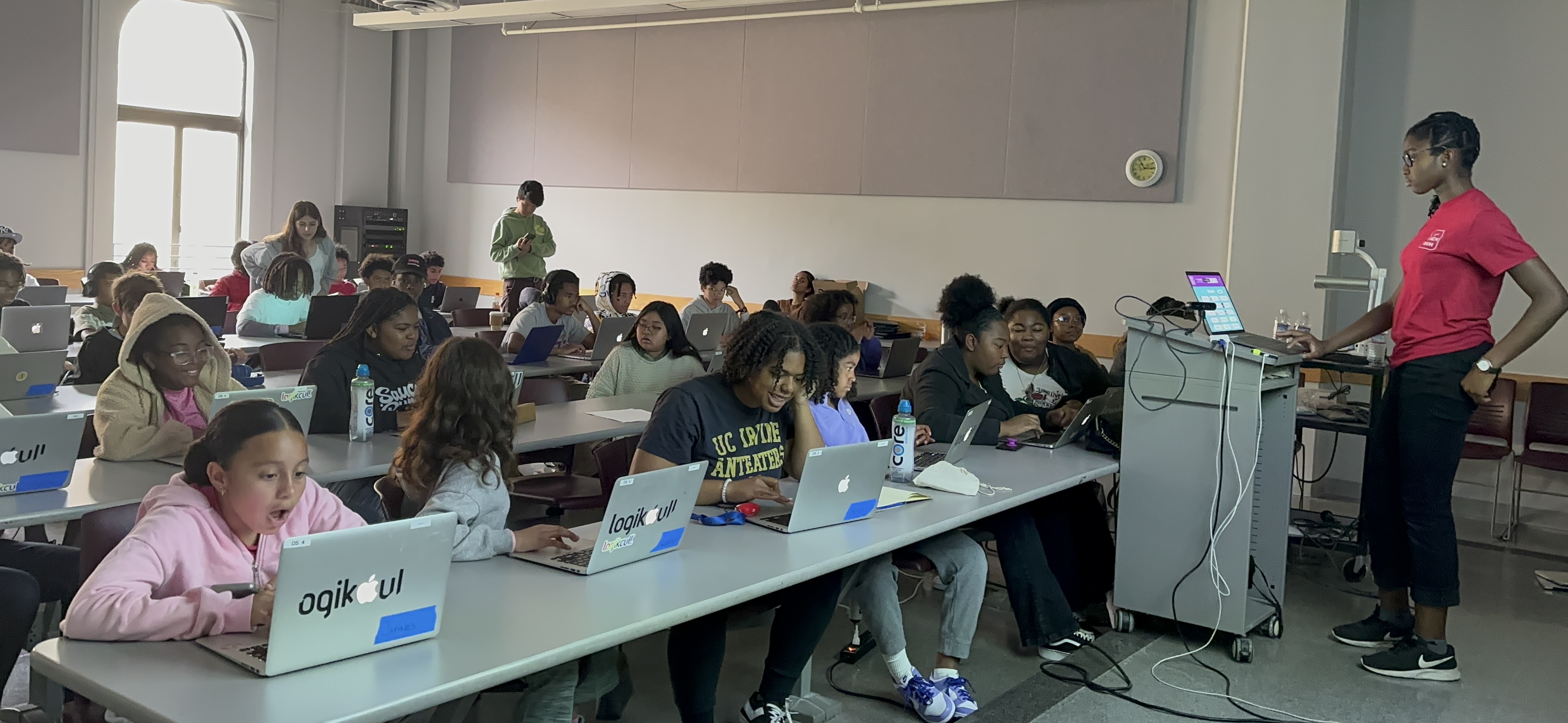 Slide Image - students and team posing for picture