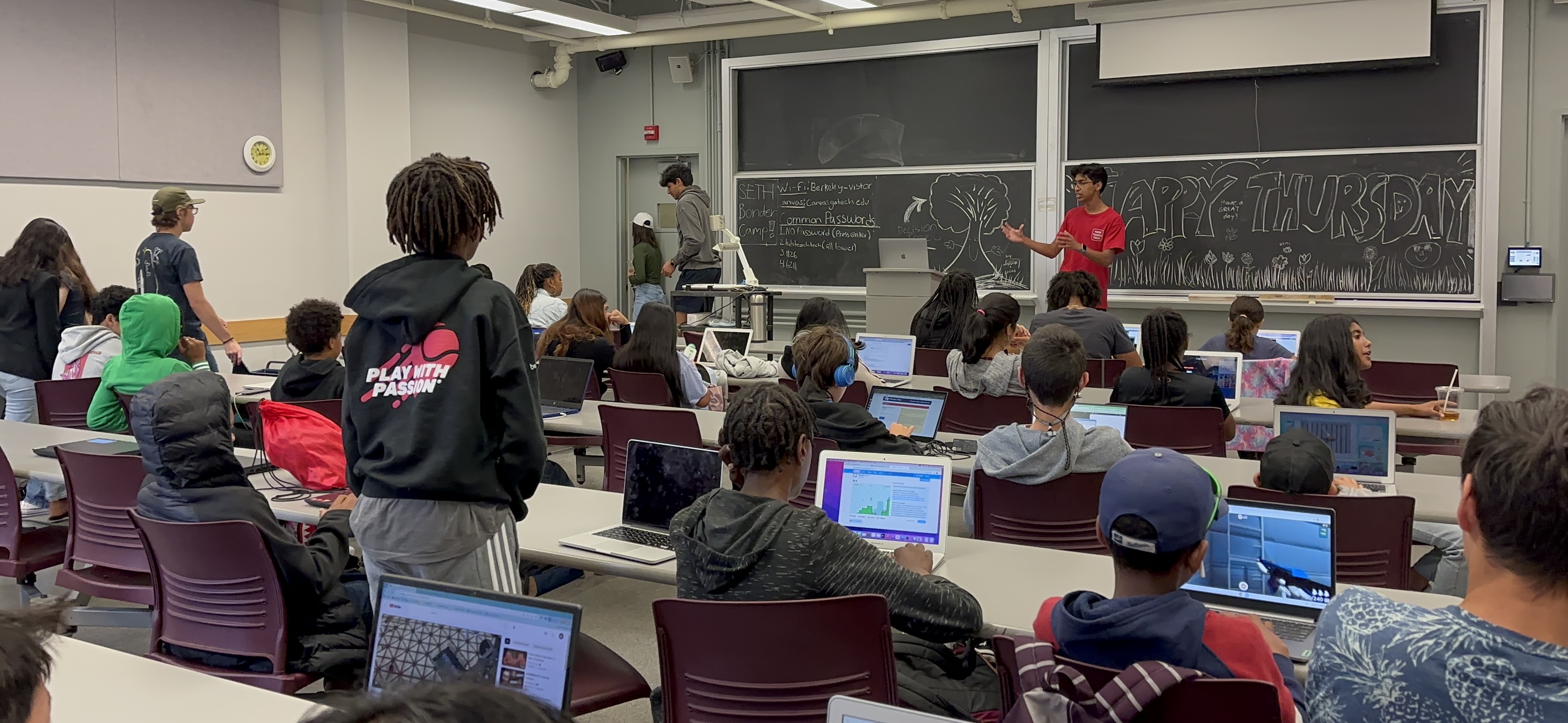 Slide Image - students and team posing for picture